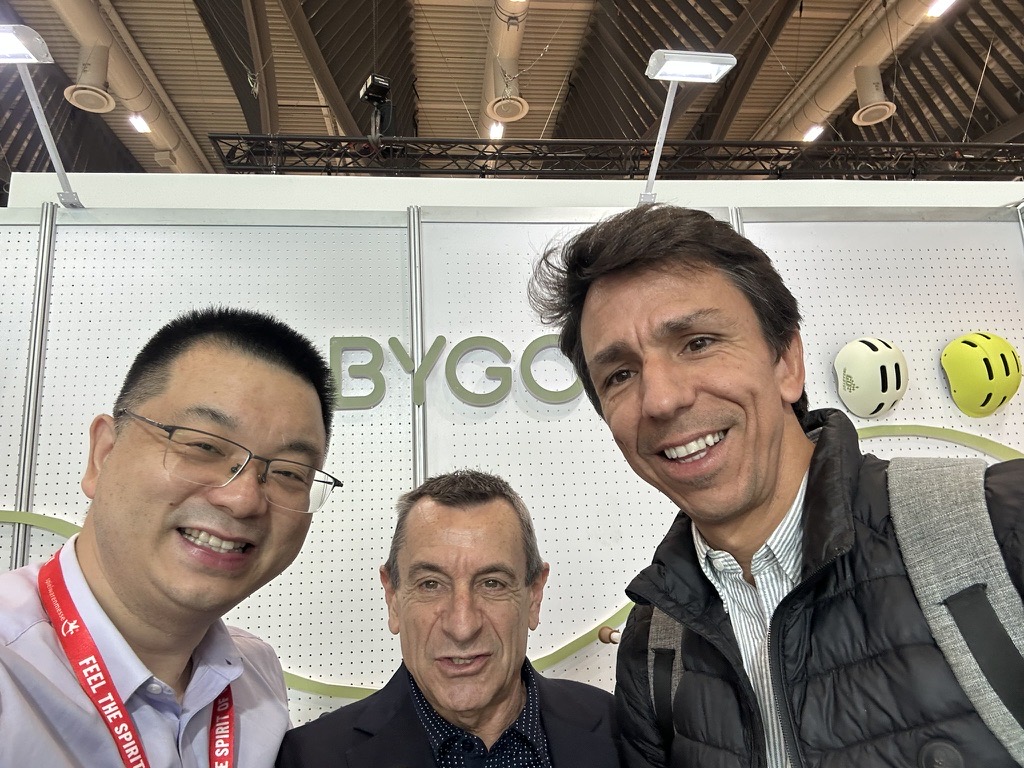 Michael Chen meeting two international visitors at the 2025 Nuremberg Toy Fair